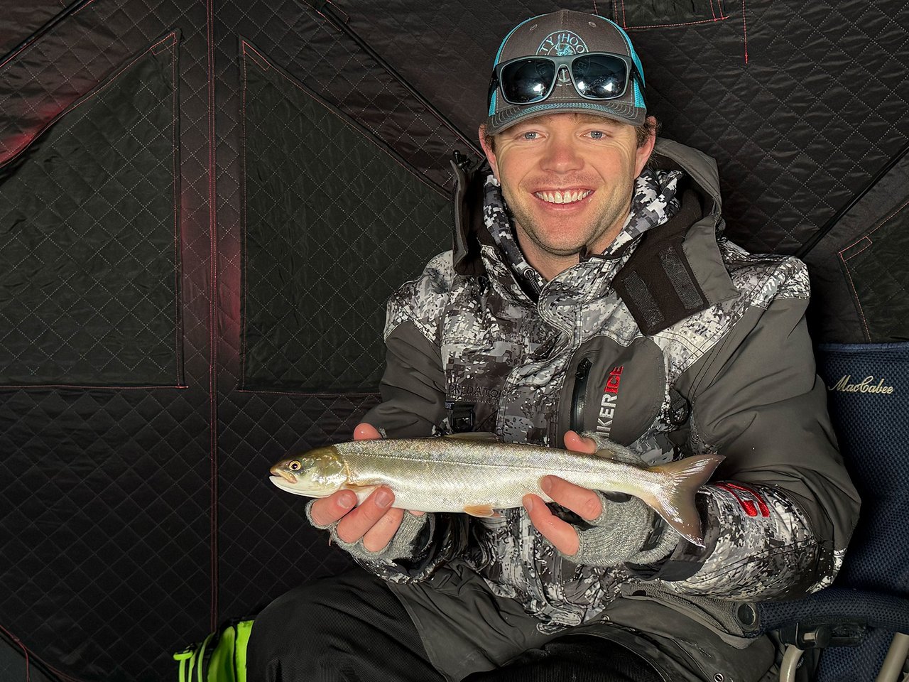 Tyler Nelson holding a fish