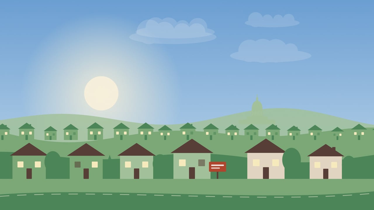 Illustration of a Dane County neighborhood on a sunny day with rows of homes, one for-sale sign, and the Wisconsin State Capitol in the distance