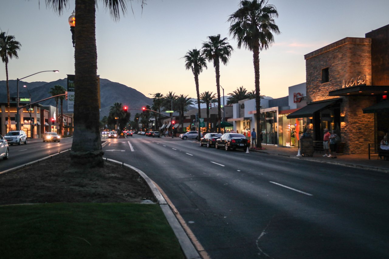 South Palm Desert neighborhood near El Paseo with homes, palm trees, and mountain views