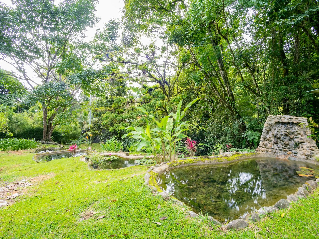 Self-Sustaining Mountain Estate for Sale in Costa Rica – 7.63 Acres with Waterfall, River & Multiple Homesites