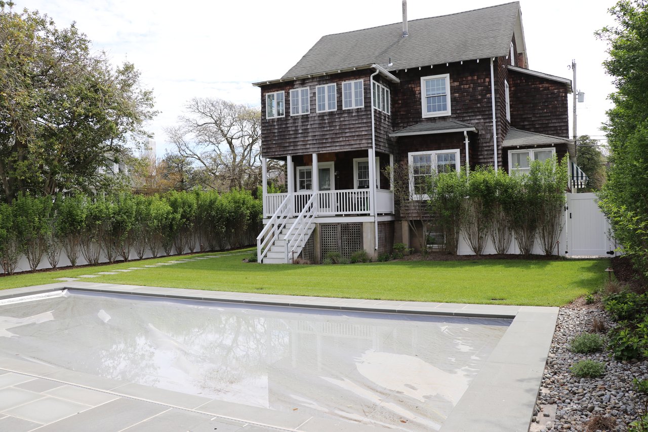 A Classic Bay Header with a Pool House