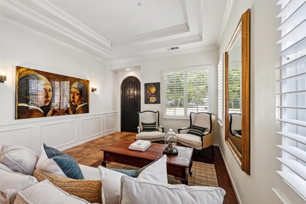 Inviting Hamilton living room featuring custom millwork, elegant design details, and warm natural light.