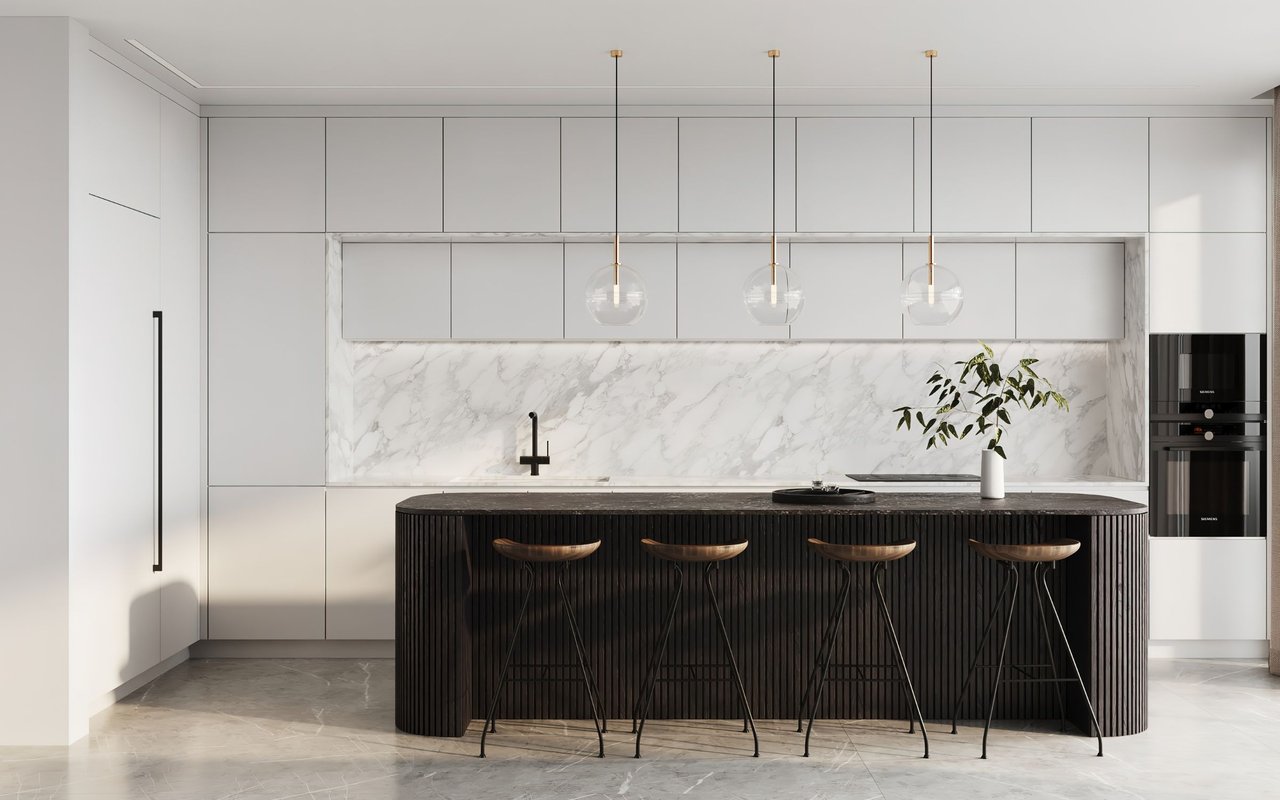 Modern kitchen with a dark fluted island, four bar stools, white cabinetry, and marble backsplash.