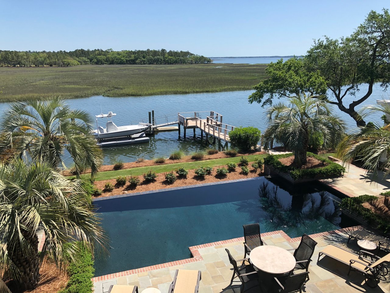 View from home on Daniel Island with swimming pool and dock
