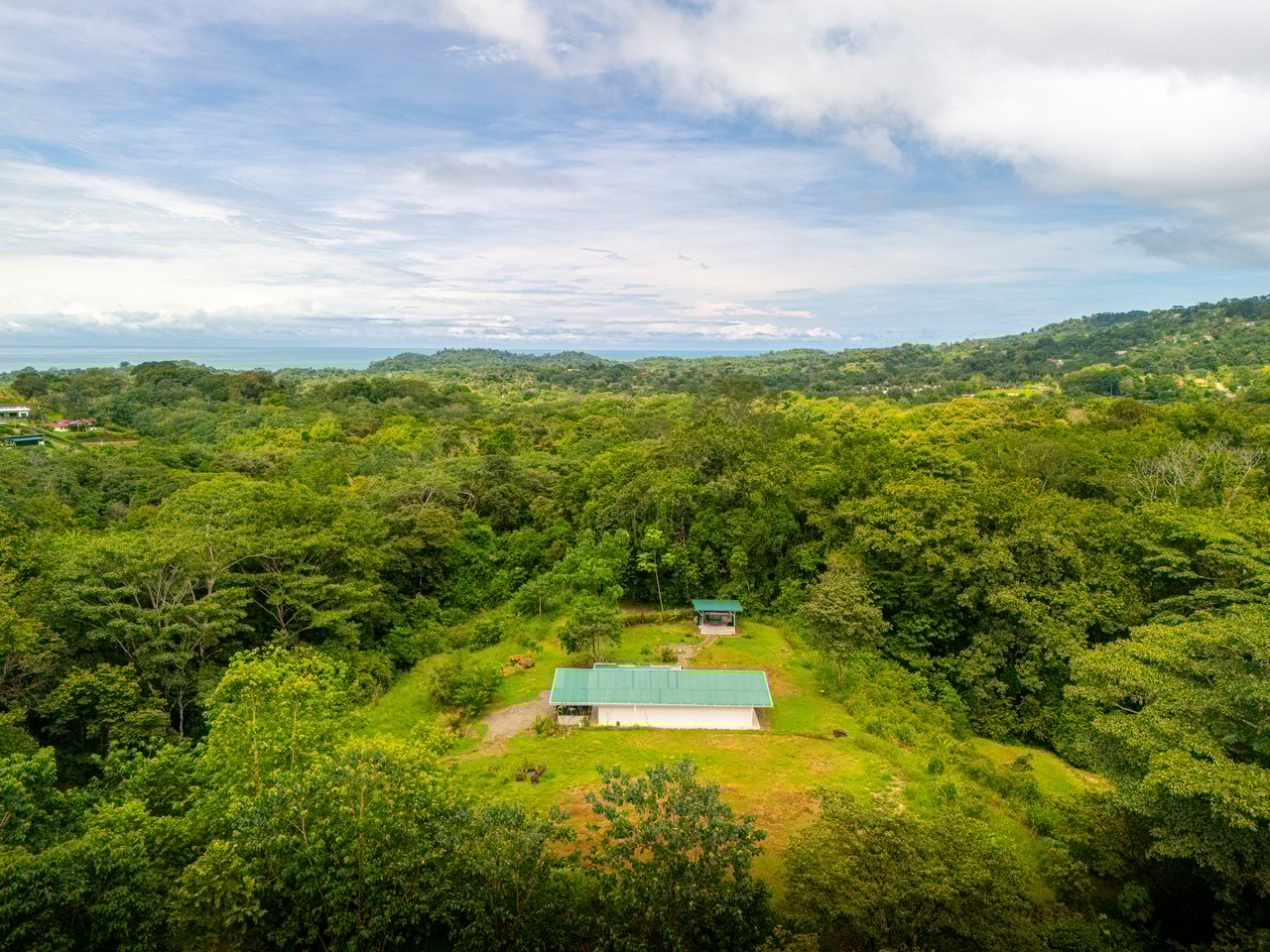 Plant Your Roots at Tierra Bendita! 2.5 Acres, River Frontage, 2 Bedroom Home, Private, Easy Access!