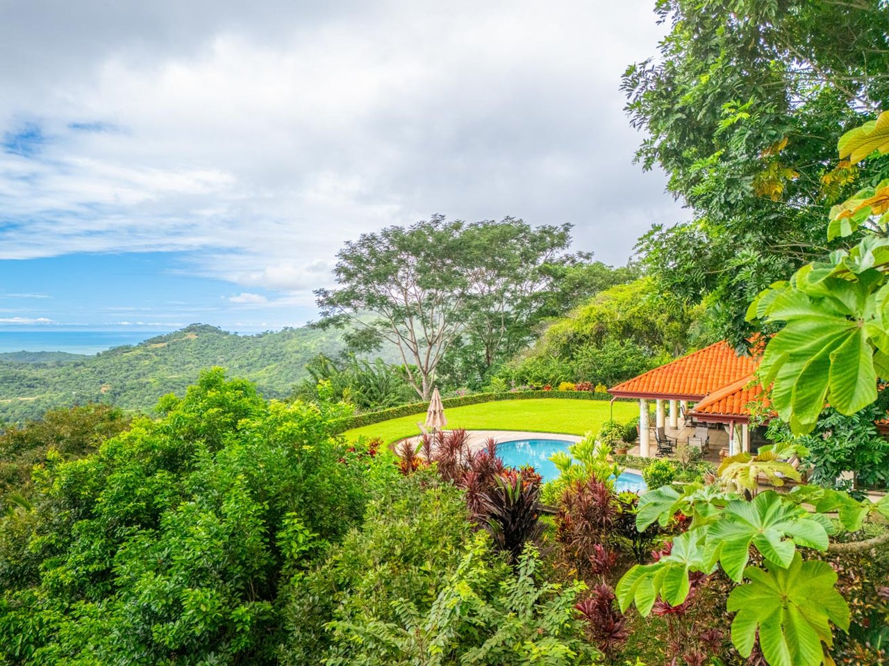 Ocean, jungle & mountain views on a meticulously landscaped 3-home family compound