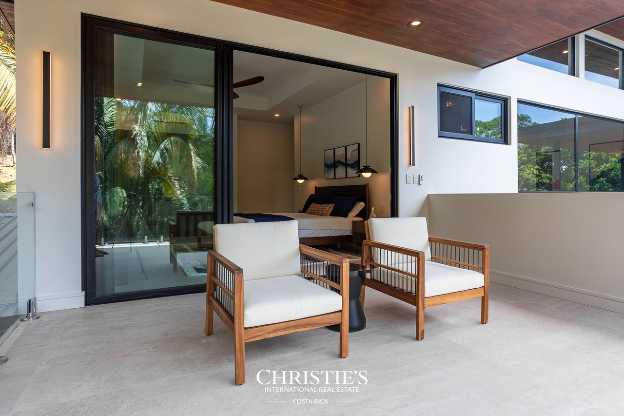 Modern Tropical Ocean & Mountain View Home
