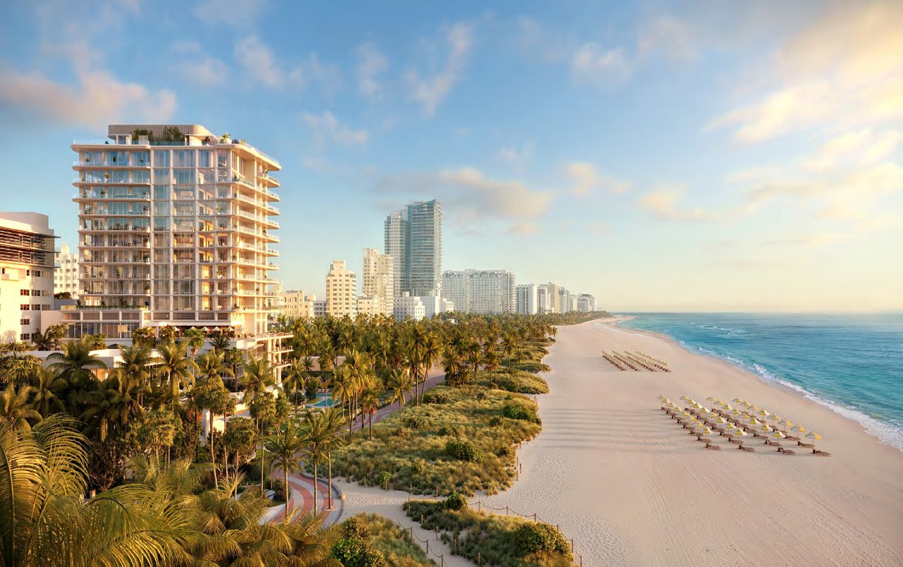 Exterior rendering of The Ritz-Carlton Residences, South Beach overlooking the Miami Beach shoreline, palm trees, sand, and the Atlantic Ocean.