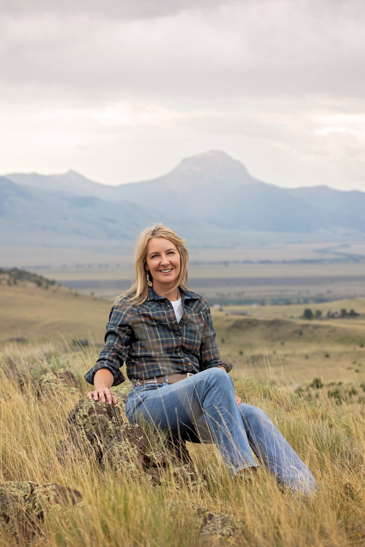 Dawn Myrvik with Sphinx Mountain of the Madison Valley in the background in Madison County Montana