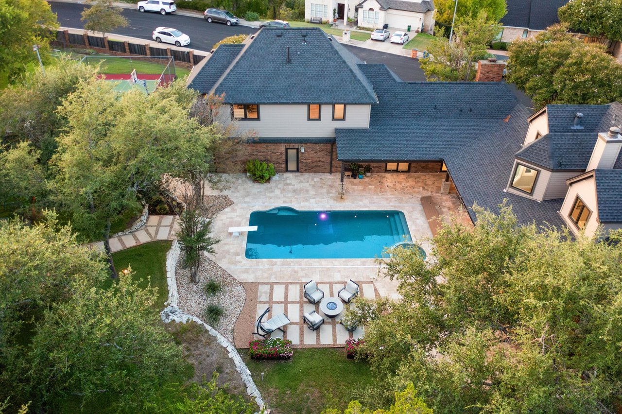 Northwest Hills legacy home with sport court, pool, and dream backyard.