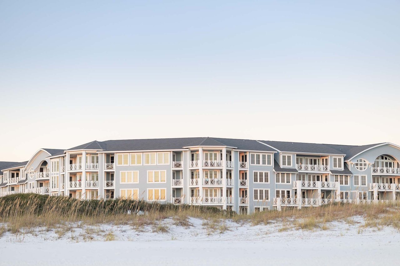 Light blue condominium located on 30A white sand beach in Watersound Florida. 