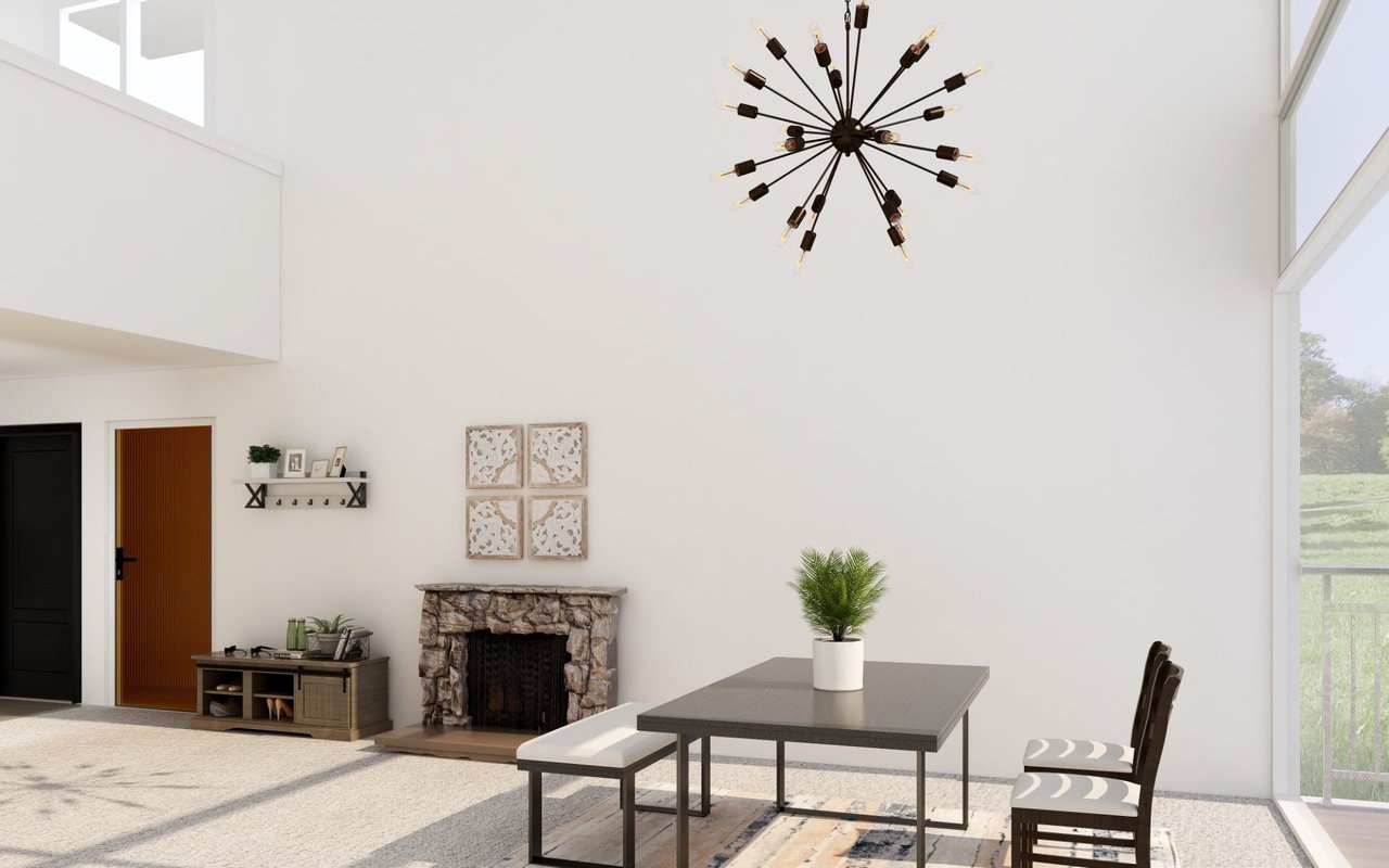 Bright living and dining area with a stone fireplace, tall windows, and a starburst chandelier.