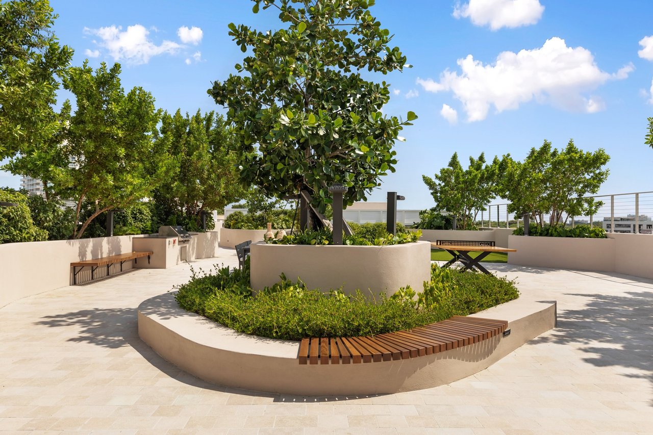Arbor Coconut Grove rooftop garden with circular planting bed and benches