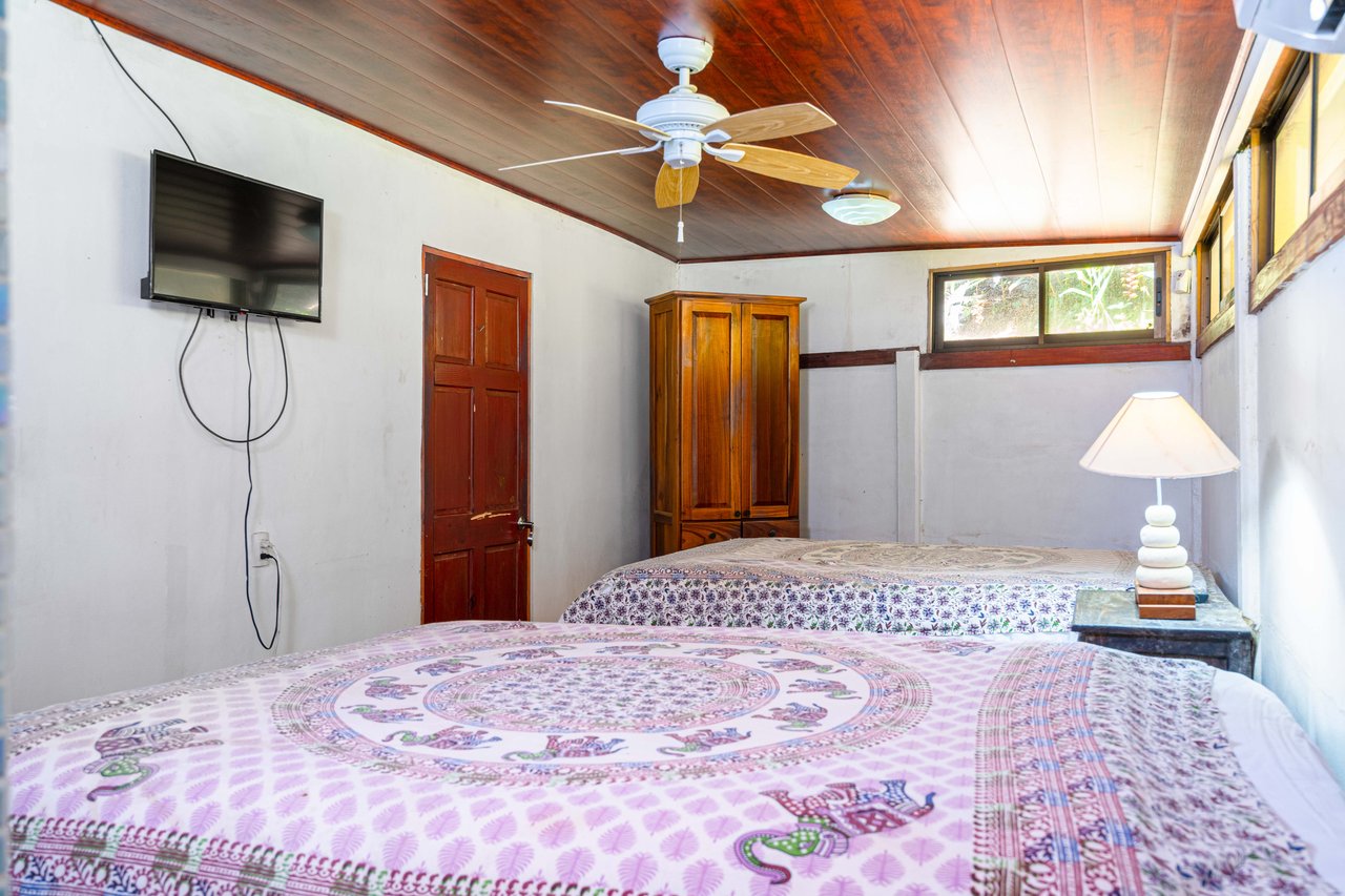 0.15 ACRES – 2 Bedroom Artistic River Home In The Rainforest!!!