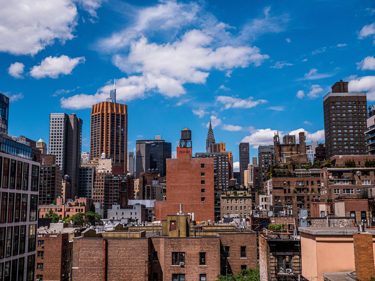 Historic brick warehouses and Renaissance Revival architecture along Laight Street in Tribeca, Manhattan.