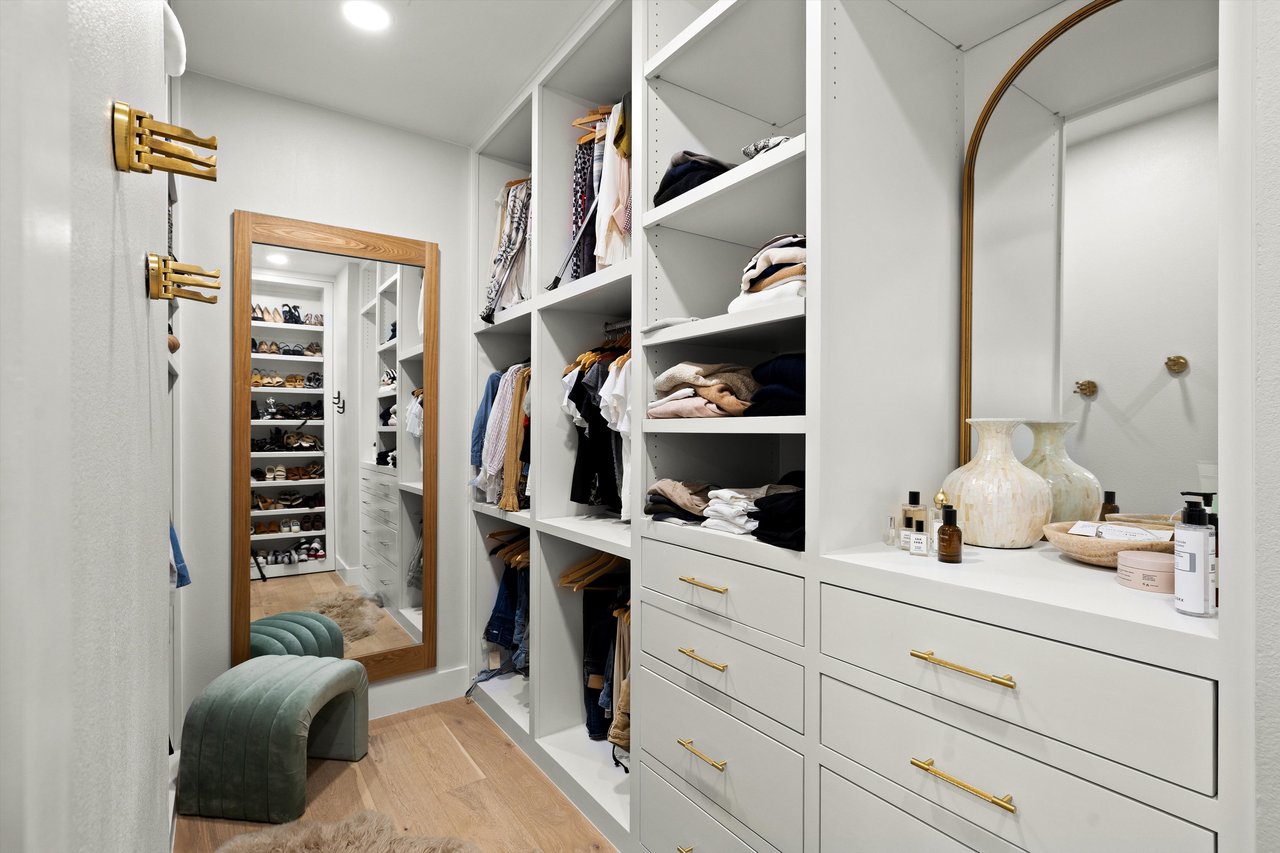 Primary suite walk-in closet number one