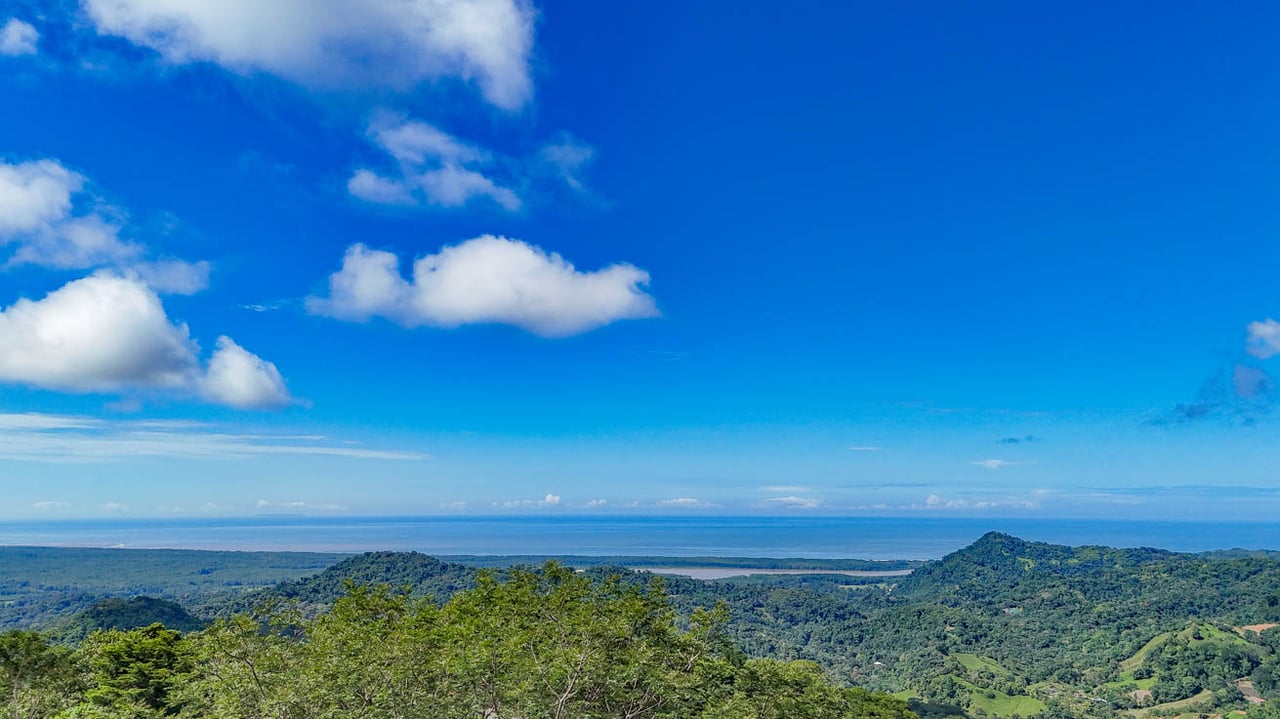 Ocean, jungle & mountain views on a meticulously landscaped 3-home family compound