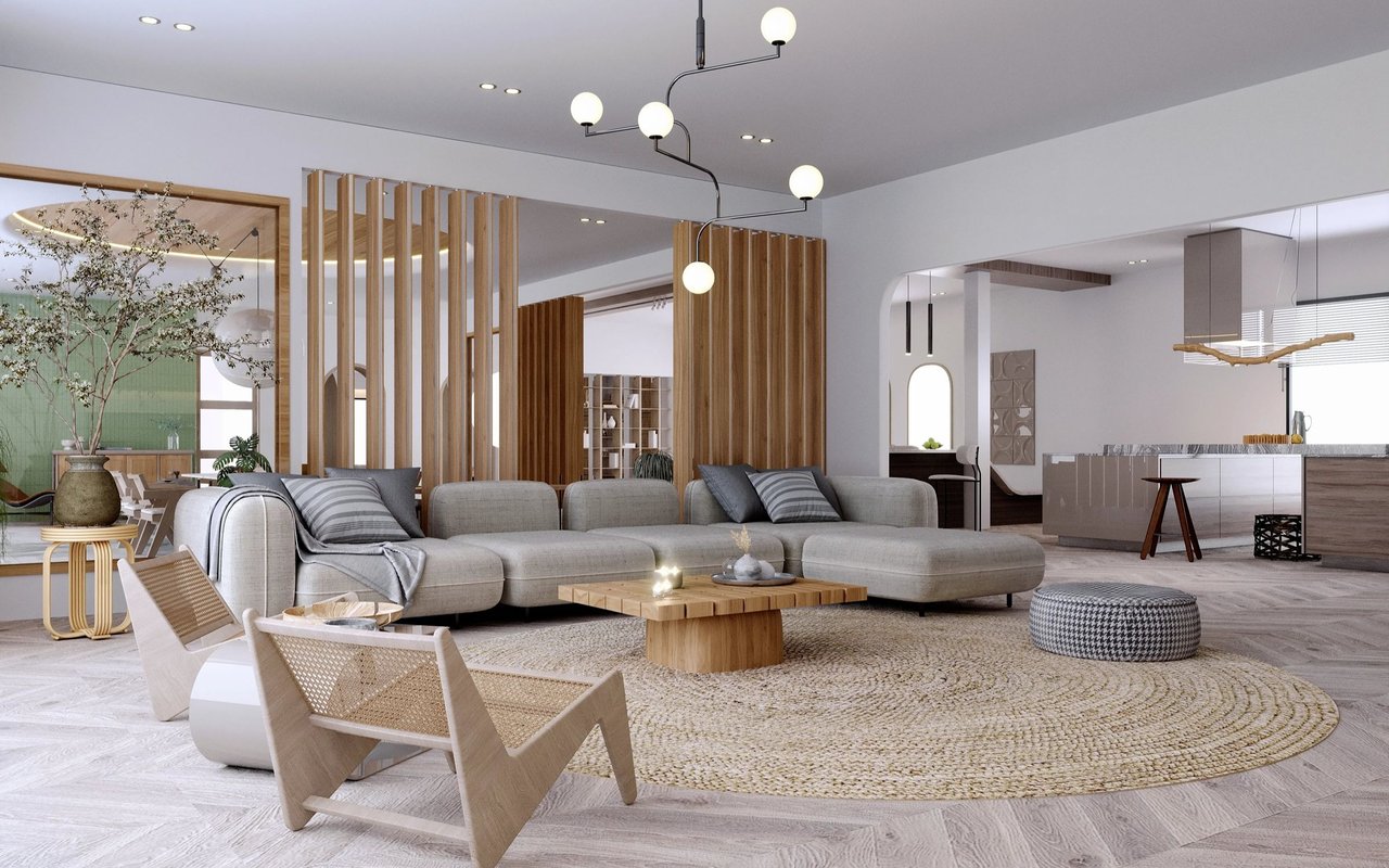 Contemporary living room with a gray sectional, wood-slat dividers, and a spacious open kitchen.