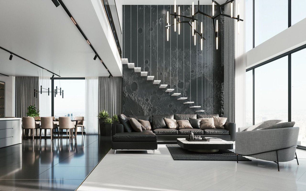 Modern living room with a floating staircase, dark feature wall, and floor-to-ceiling windows.