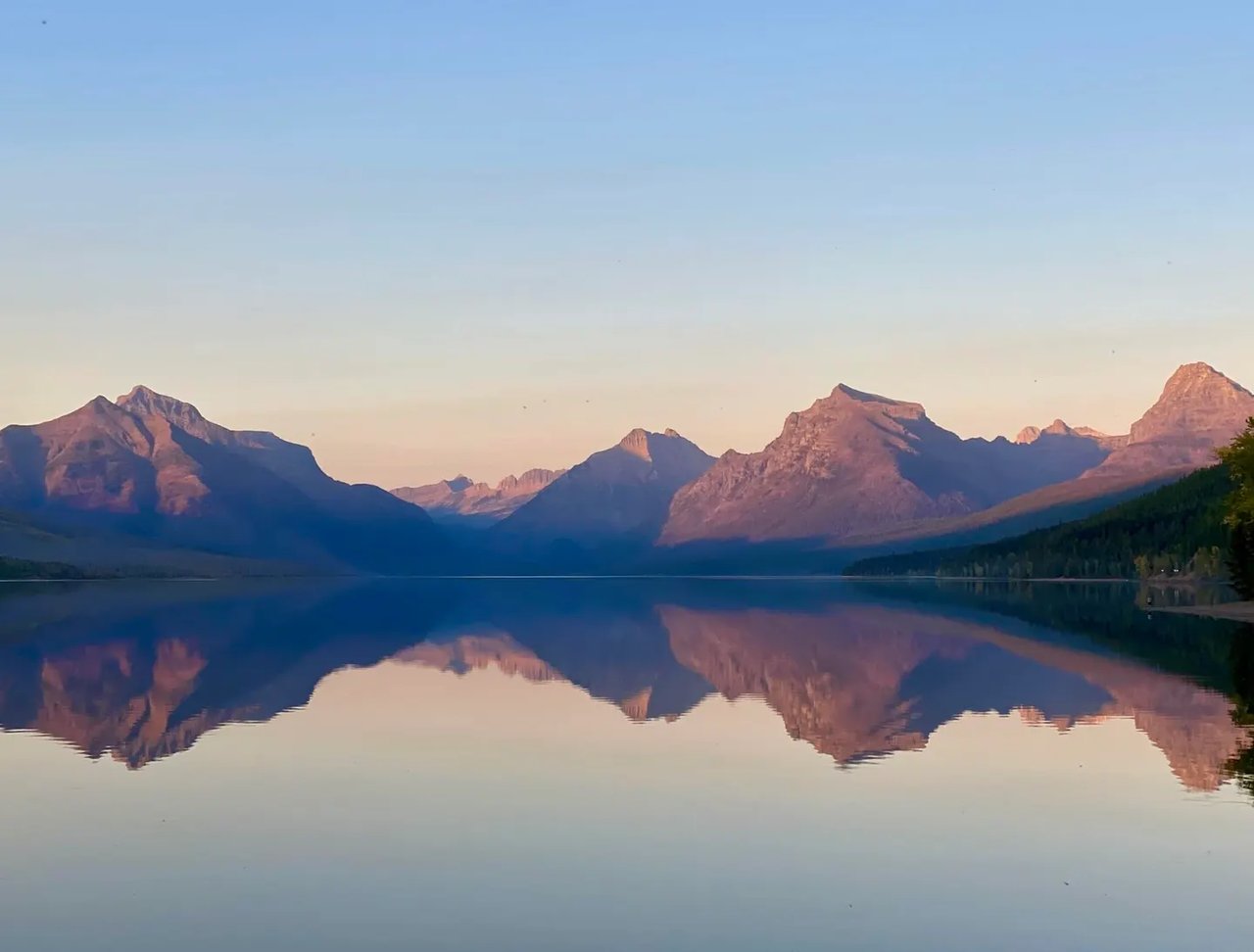 View of Lake McDonald in Glacier National Park from 586 Apgar Loop represented by Michael Anderson and Tyler Anderson of National Parks Realty.