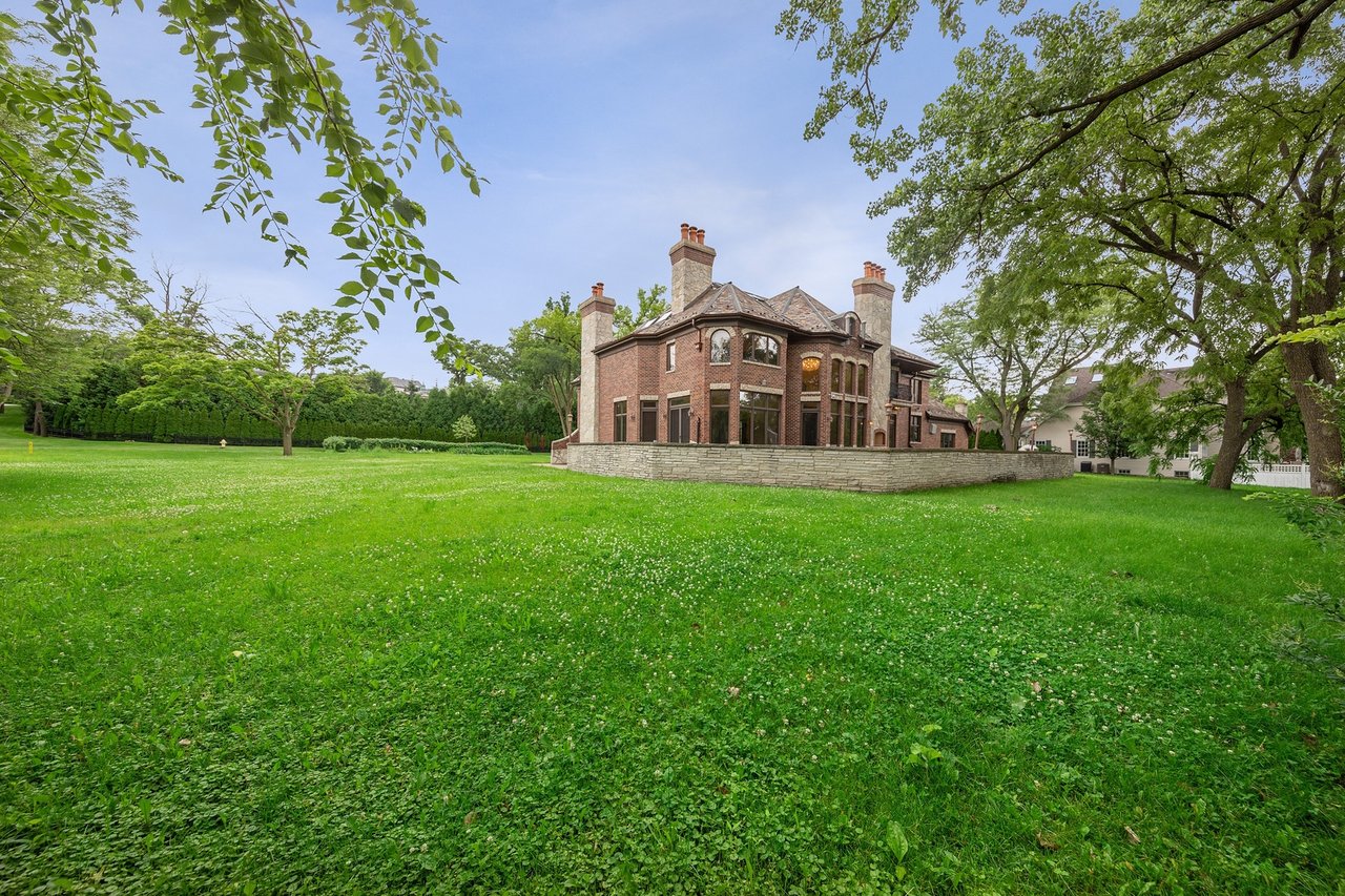 Brick And Stone Estate Situated On A Quiet Street In The Woodlands Of Hinsdale
