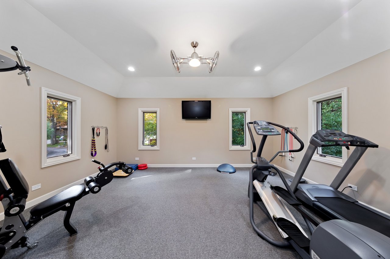 Beautifully Appointed Home in a Gated Community on Over an Acre of Professionally Landscaped Grounds with Pond Views