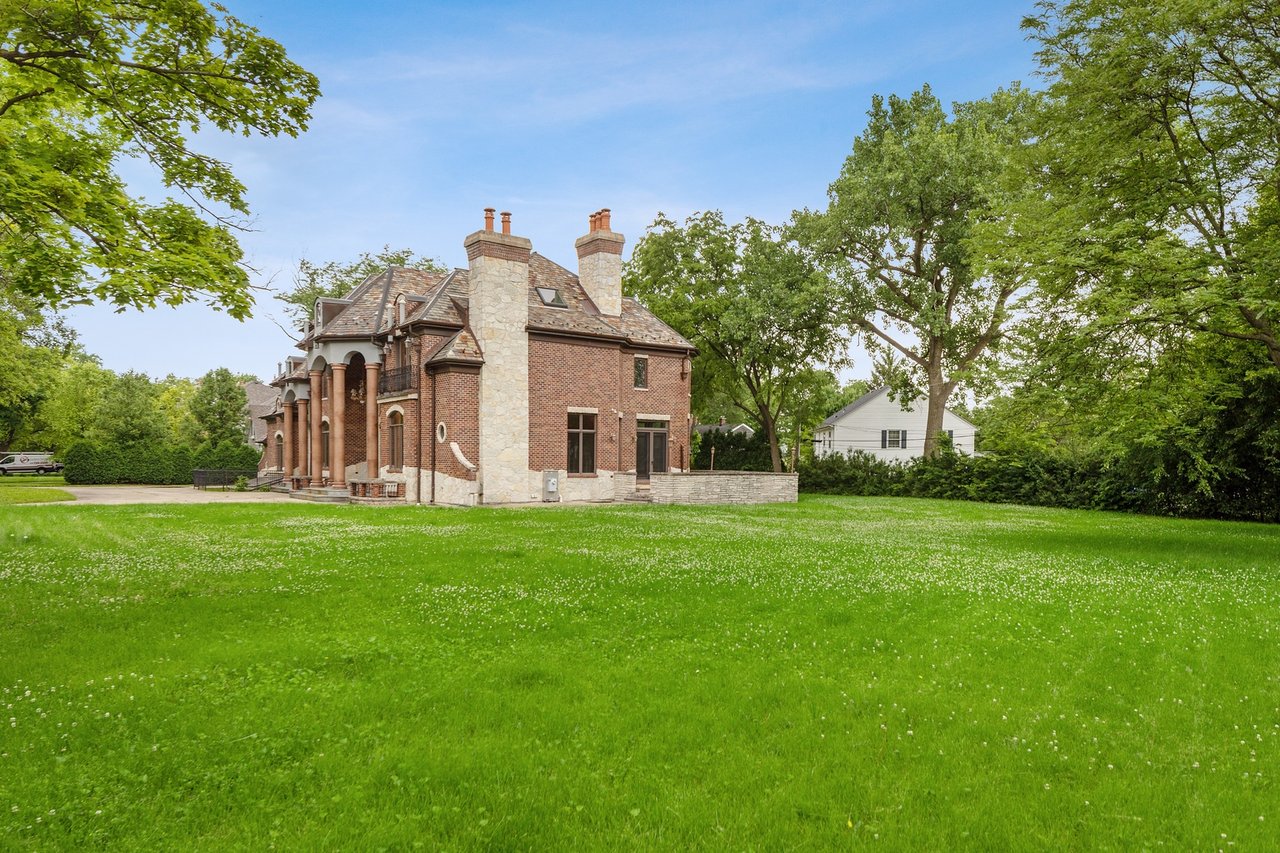 Brick And Stone Estate Situated On A Quiet Street In The Woodlands Of Hinsdale