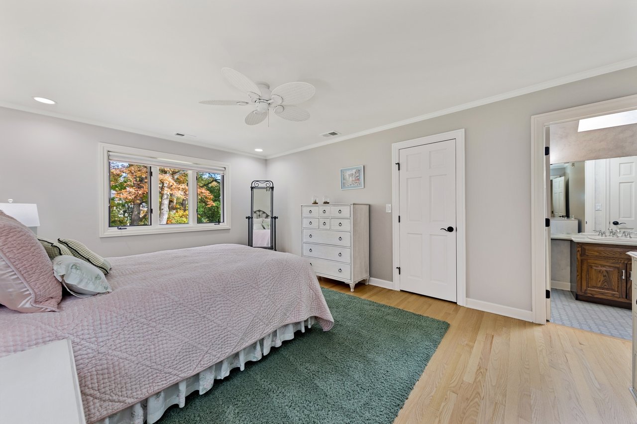 Beautifully Appointed Home in a Gated Community on Over an Acre of Professionally Landscaped Grounds with Pond Views