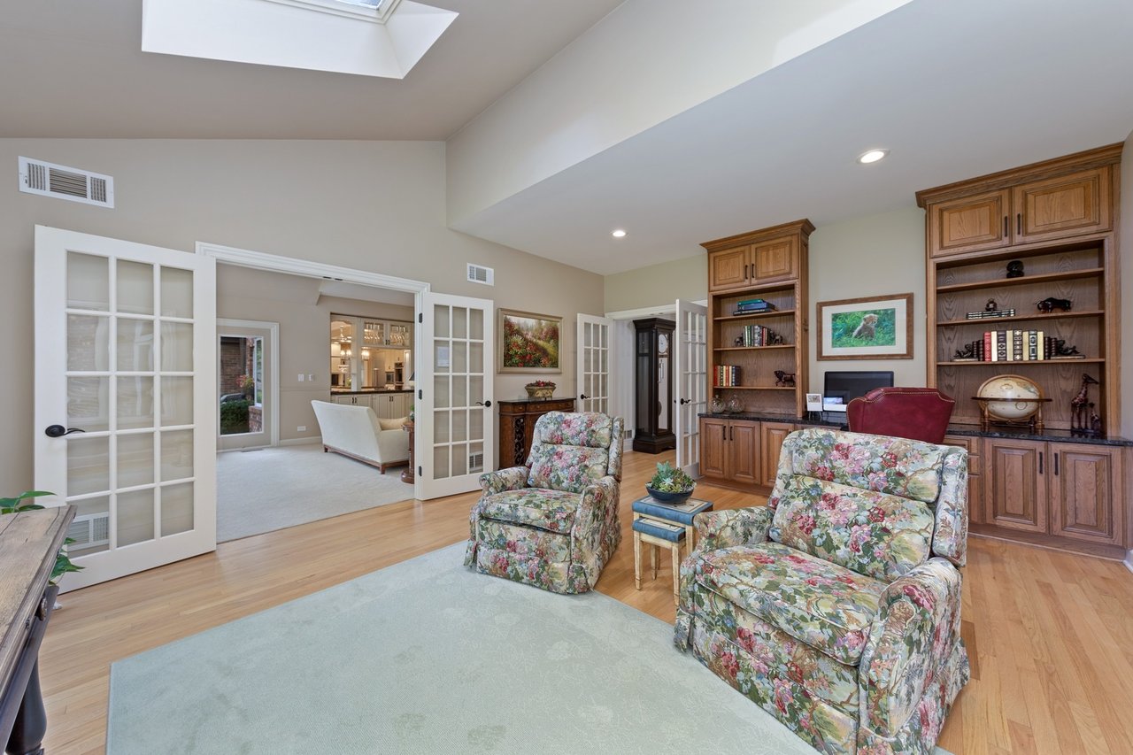 Beautifully Appointed Home in a Gated Community on Over an Acre of Professionally Landscaped Grounds with Pond Views