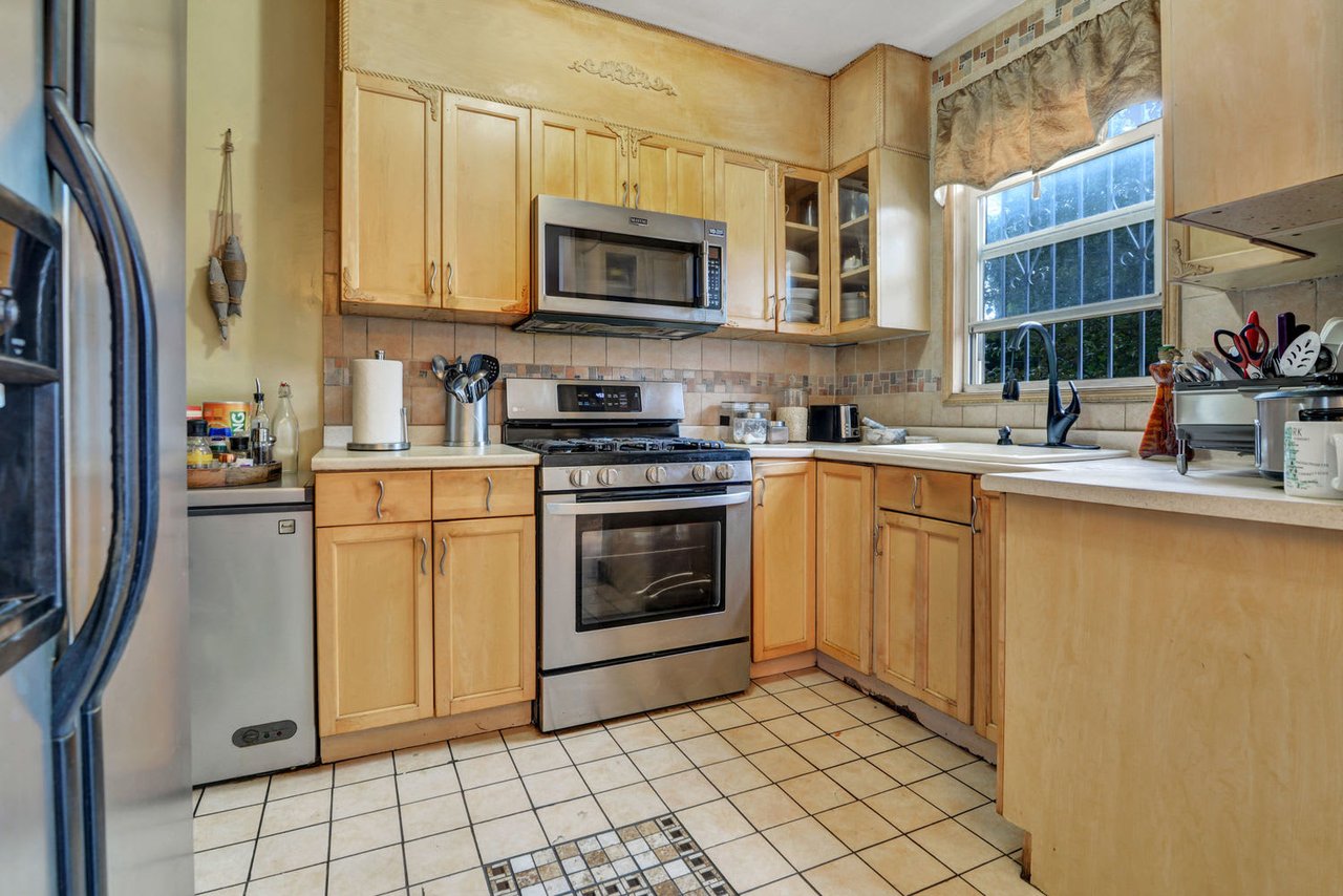 23-12 95th St