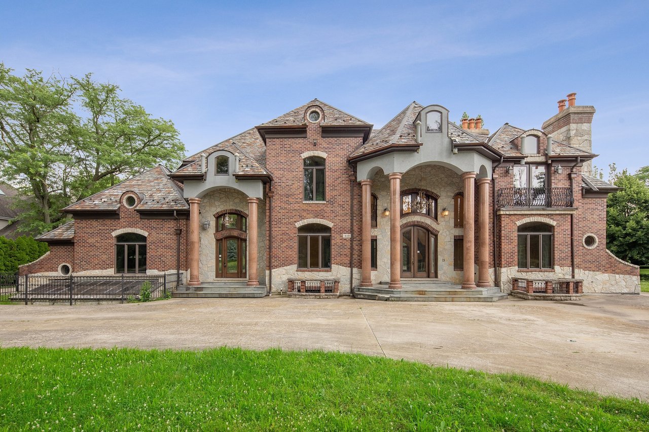 Brick And Stone Estate Situated On A Quiet Street In The Woodlands Of Hinsdale