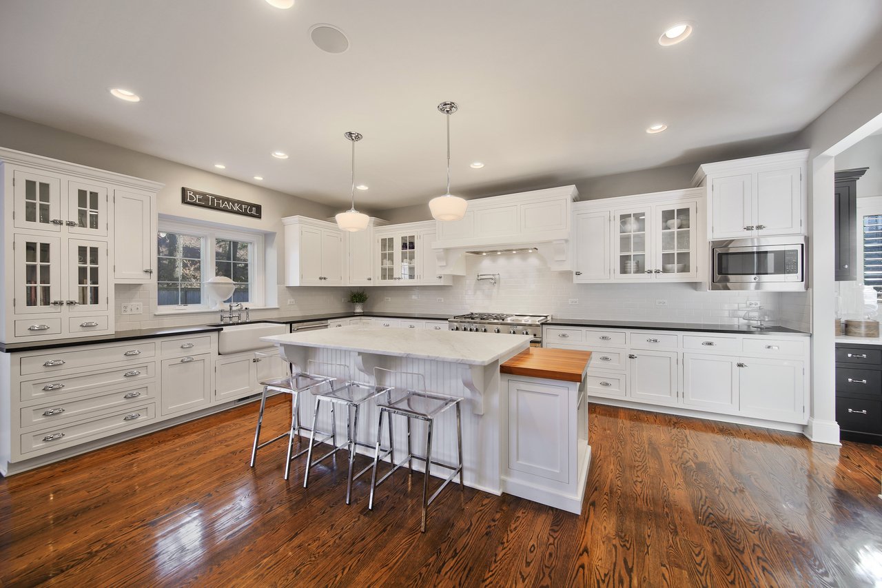 The Tree-lined Street And A Perfectly Manicured Yard Welcome You To The Entry Of The Home