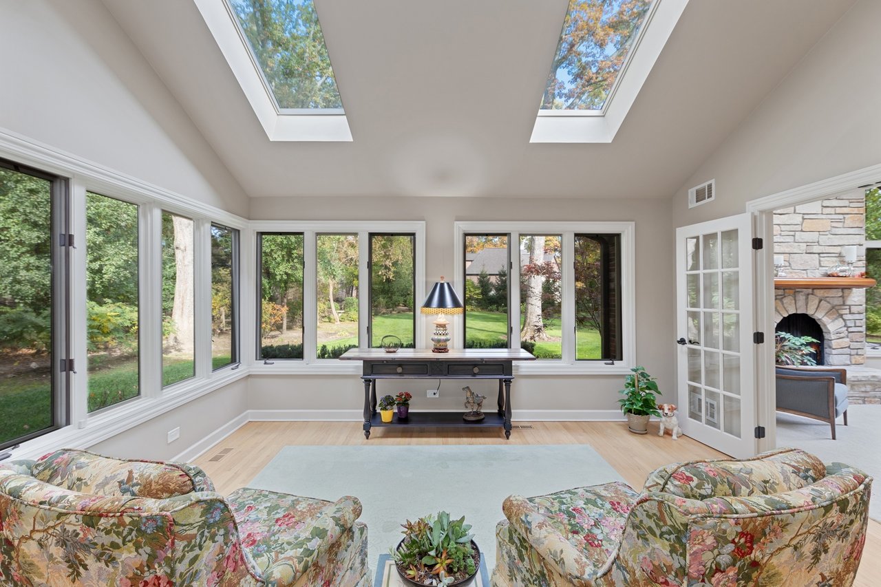 Beautifully Appointed Home in a Gated Community on Over an Acre of Professionally Landscaped Grounds with Pond Views