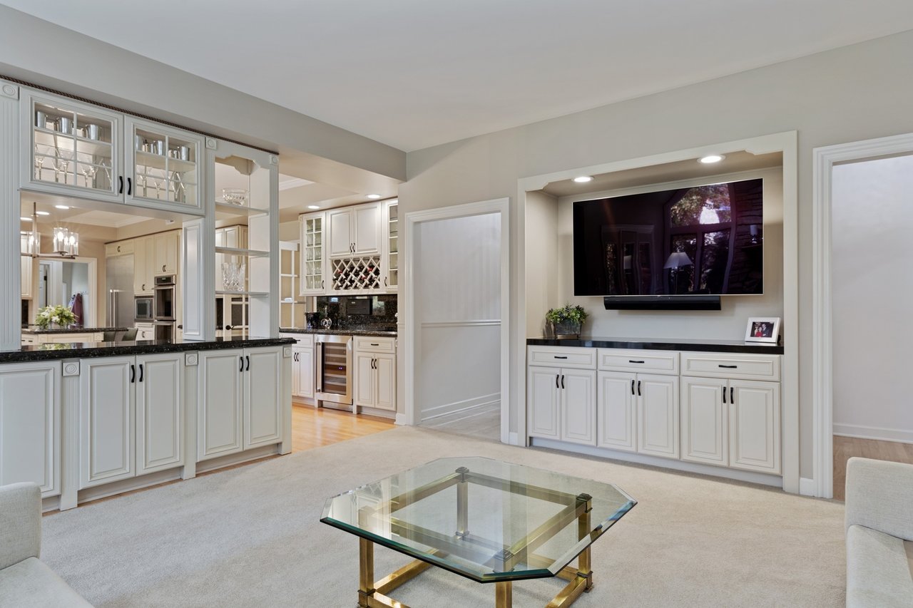 Beautifully Appointed Home in a Gated Community on Over an Acre of Professionally Landscaped Grounds with Pond Views