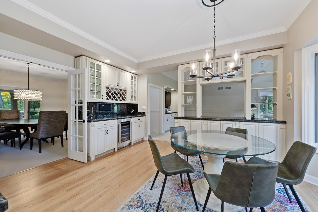Beautifully Appointed Home in a Gated Community on Over an Acre of Professionally Landscaped Grounds with Pond Views