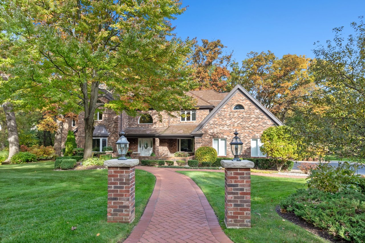Beautifully Appointed Home in a Gated Community on Over an Acre of Professionally Landscaped Grounds with Pond Views