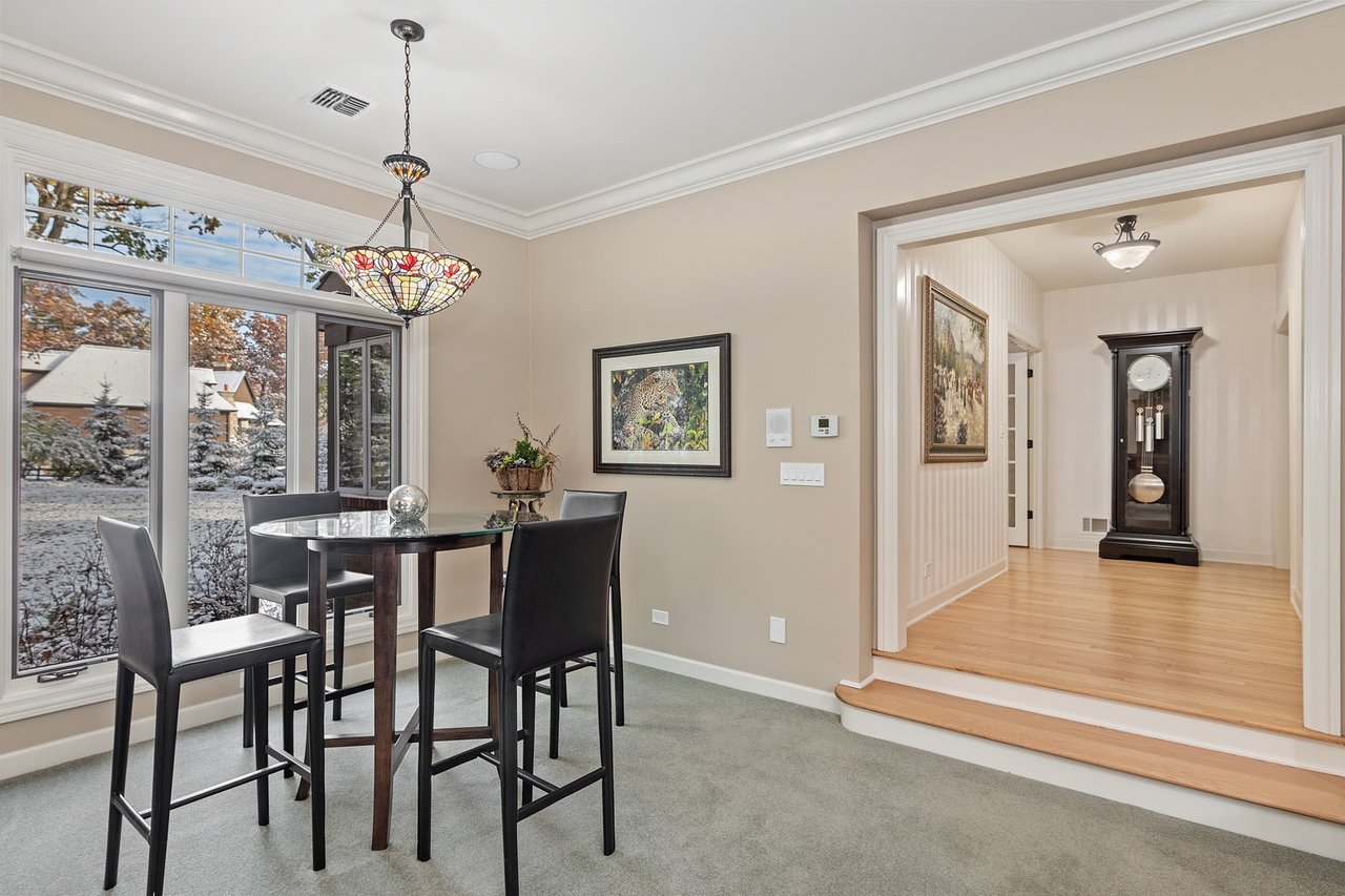 Beautifully Appointed Home in a Gated Community on Over an Acre of Professionally Landscaped Grounds with Pond Views