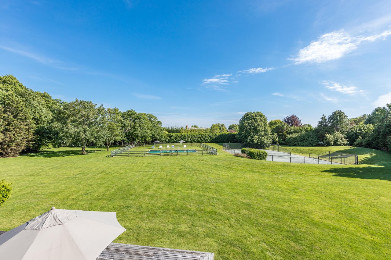 Stunning Water Mill Property with Sprawling Grounds and Massive Potential