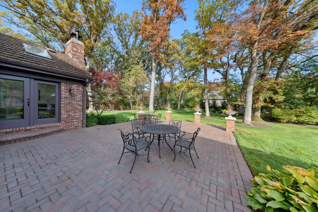 Beautifully Appointed Home in a Gated Community on Over an Acre of Professionally Landscaped Grounds with Pond Views