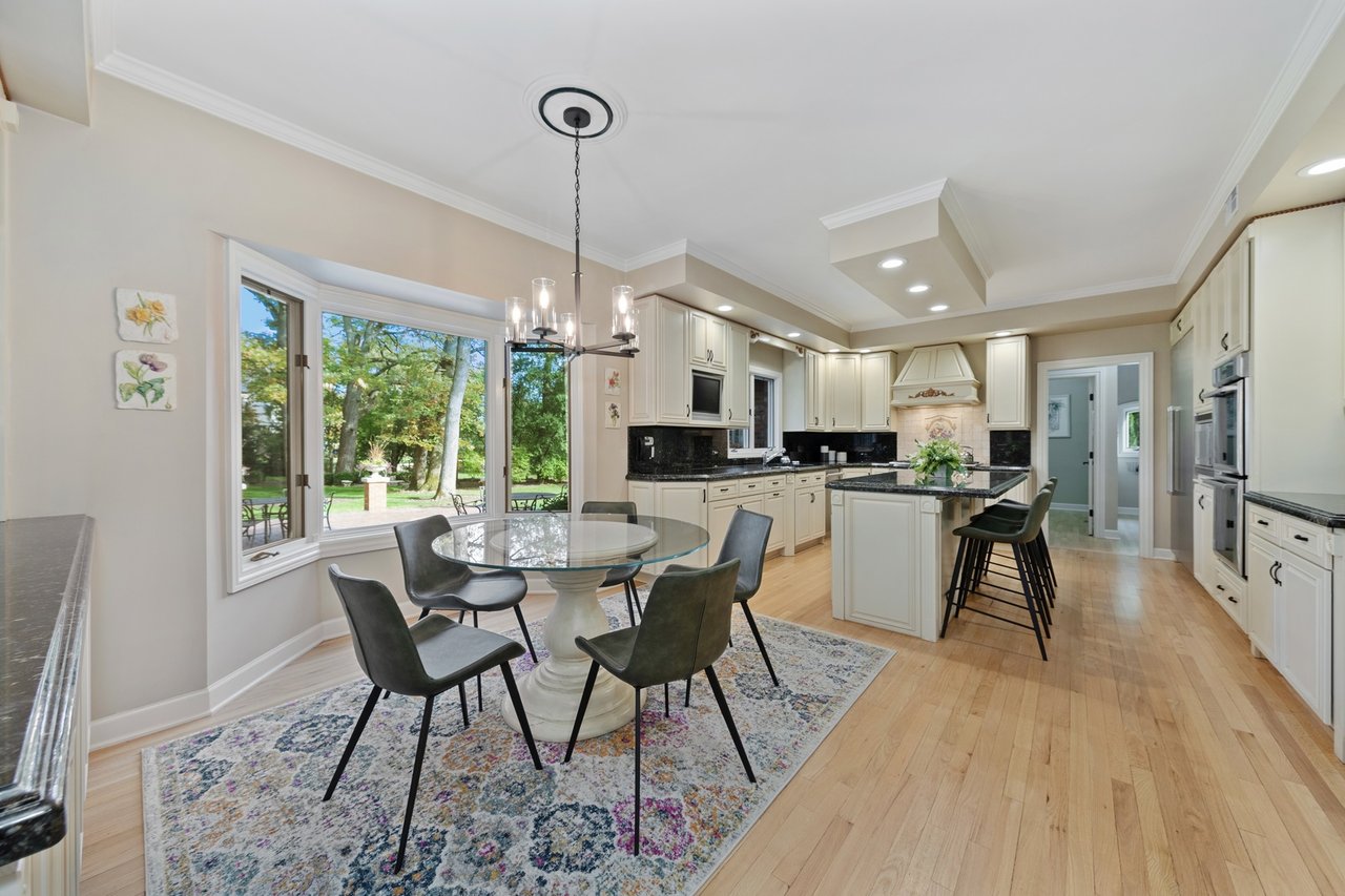Beautifully Appointed Home in a Gated Community on Over an Acre of Professionally Landscaped Grounds with Pond Views