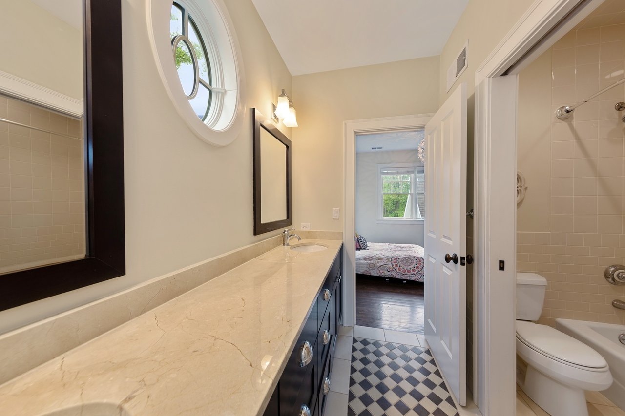 Timeless elegance meets transitional flair in builder's own award winning home