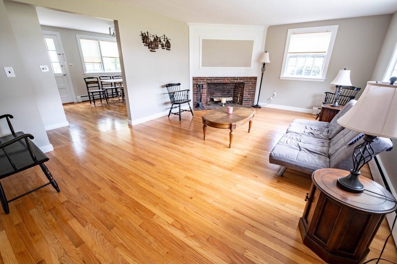 Living room with wood-burning fireplace