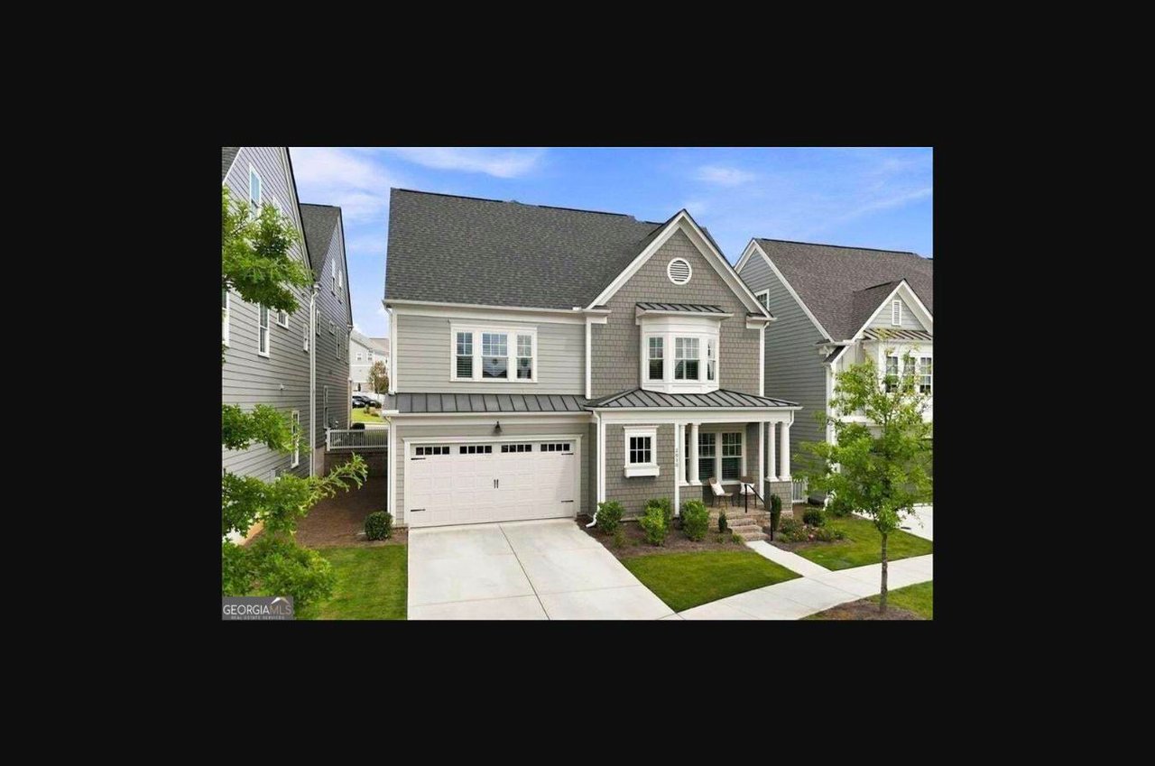 Exterior of 2010 Cottonwood Lane townhome for sale in Woodstock, GA