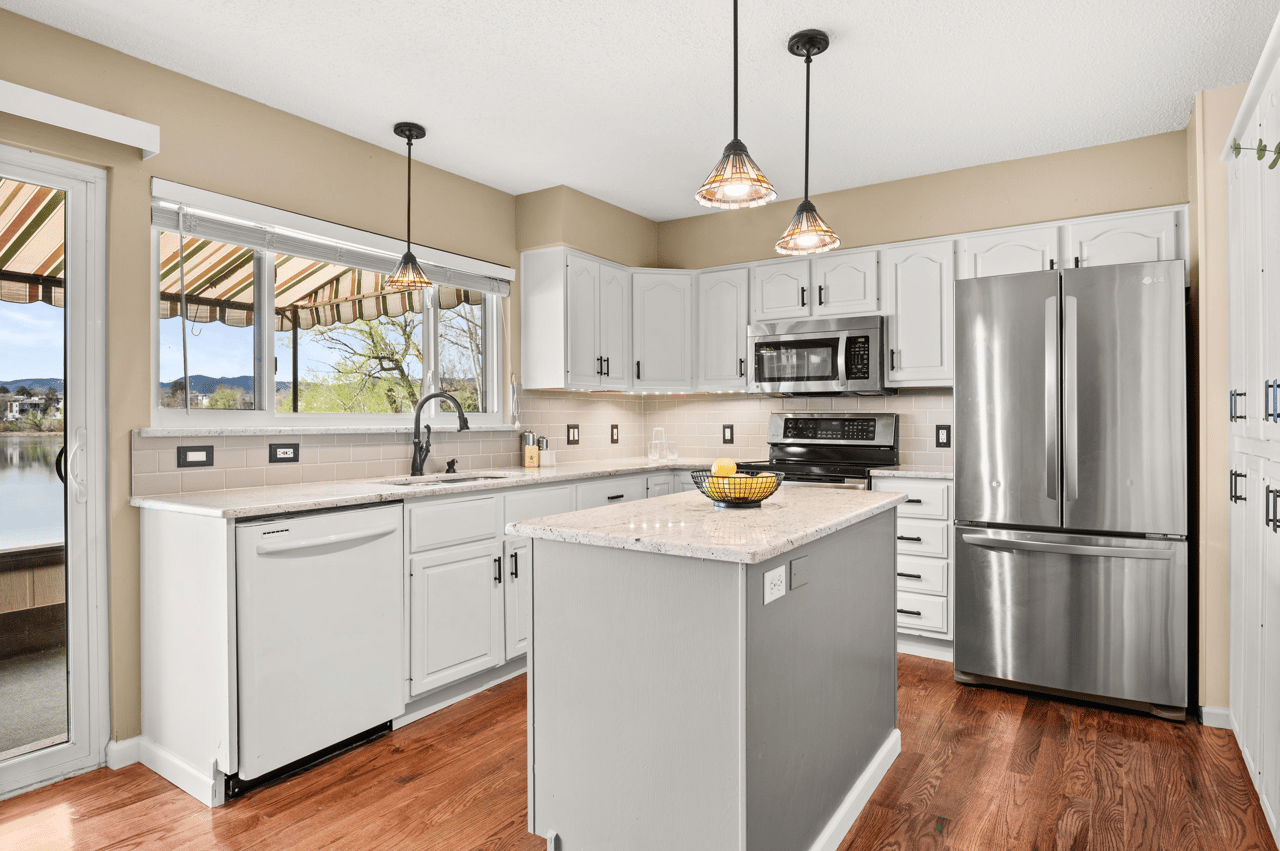 Just Listed: Experience Lakeside Serenity in this Captivating Townhome!