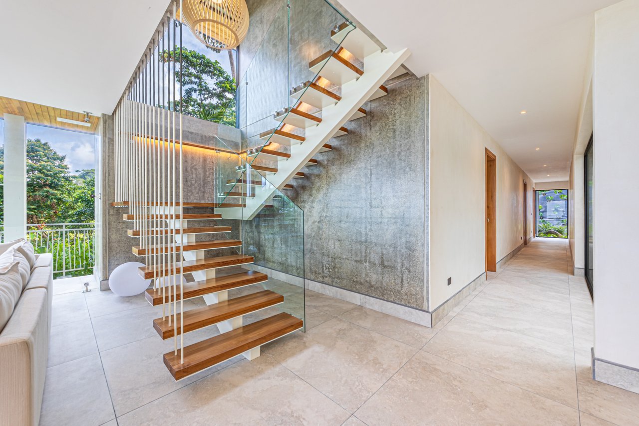 New contemporary tropical villa boasts with a movie theater and views of the iconic whale’s tail