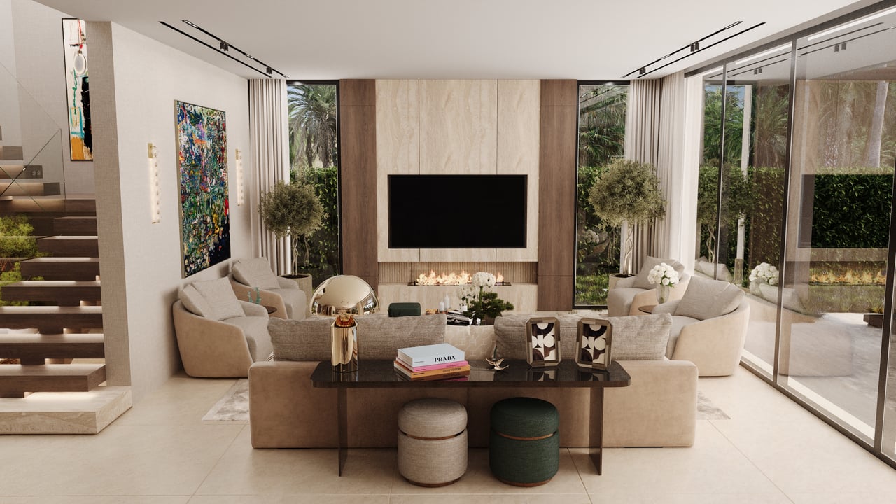 Modern living room with a linear fireplace, neutral sofas, and glass doors overlooking lush greenery.