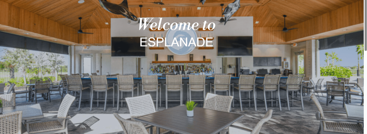 Esplanade clubhouse bar and covered patio with dining tables and lounge seating.