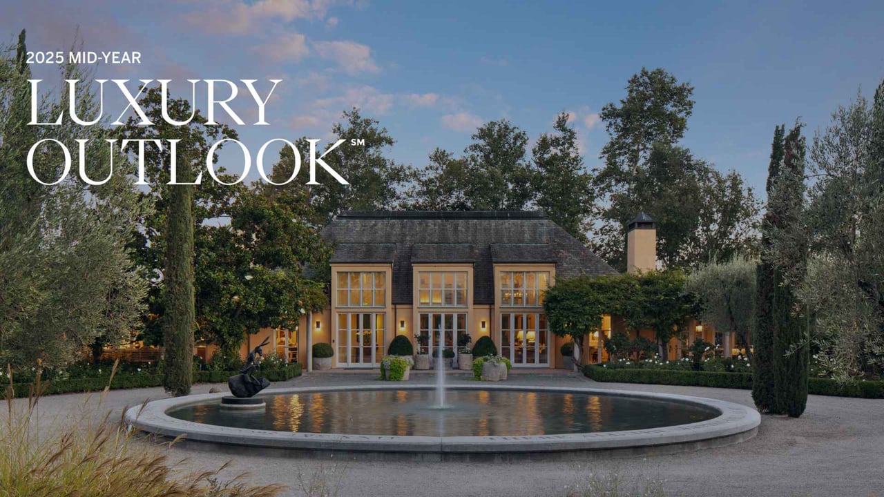 Luxury estate with fountain at sunset featured on the 2025 Mid-Year Luxury Outlook report cover by Sotheby’s International Realty