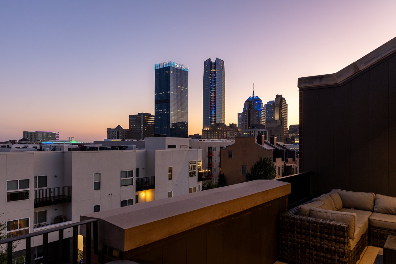 View of OKC skyline from the rooftop patio of Deep Deuce Townhome 