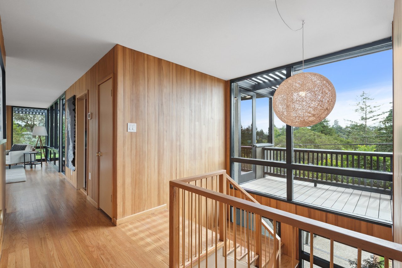 Original wood paneling and midcentury features